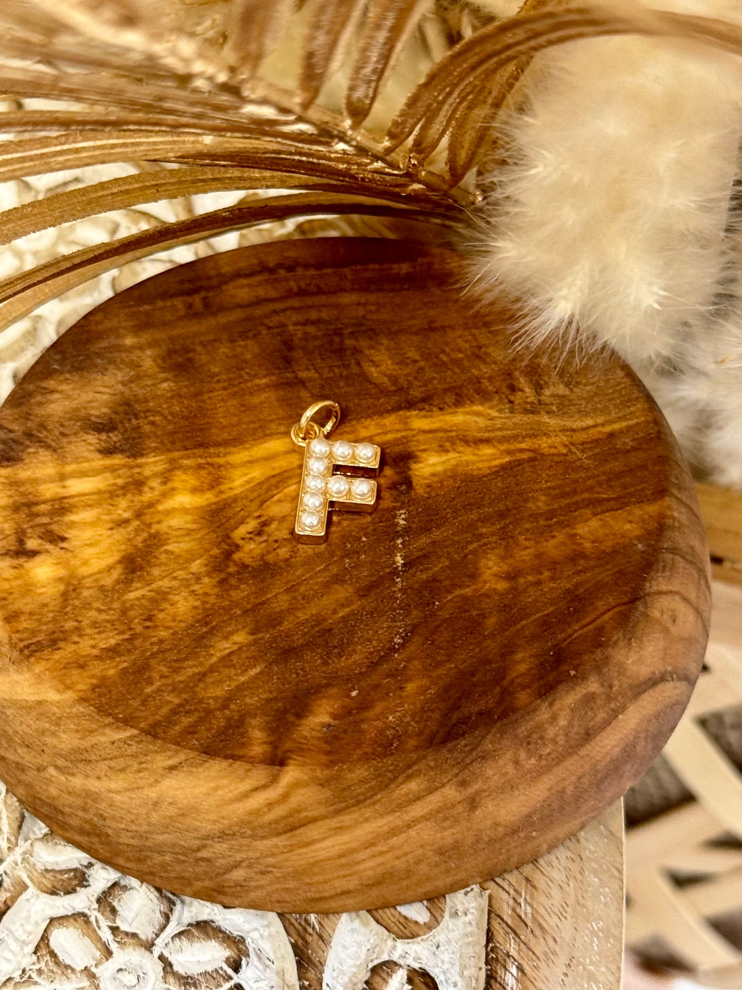 charm  initial F