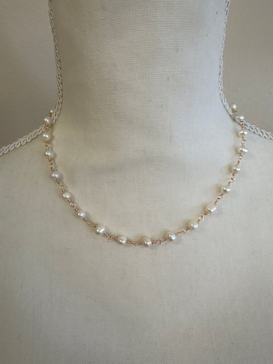 Pearl necklace charm bar